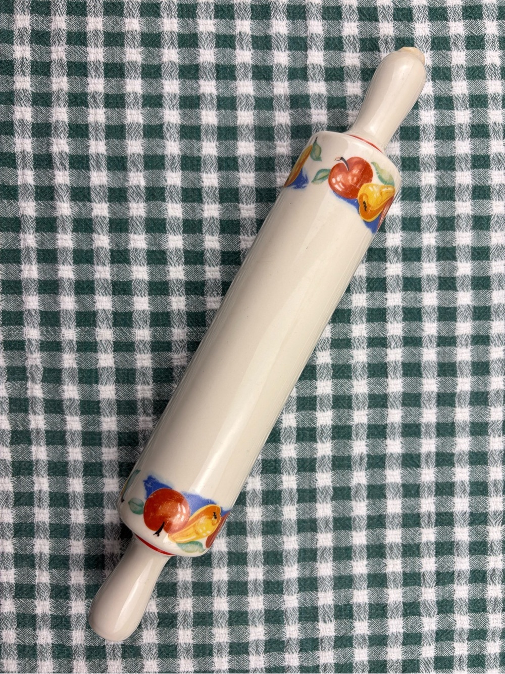 Vintage Harker pottery ceramic rolling pin decorated with a fruit pattern